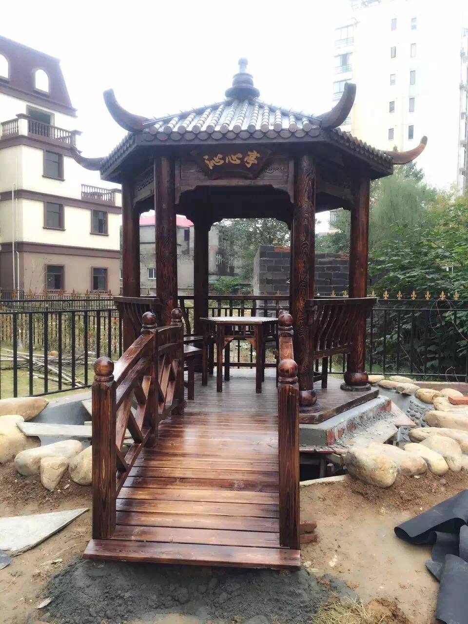 凉亭厂家直销碳化木防腐木庭院木屋户外实木亭子六角仿古原木质亭