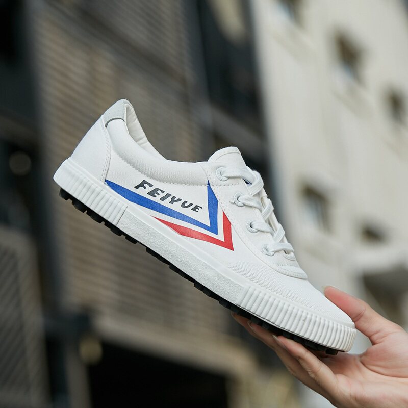 飞跃足球鞋人造草地情侣tf轻便训练比赛碎钉足球鞋