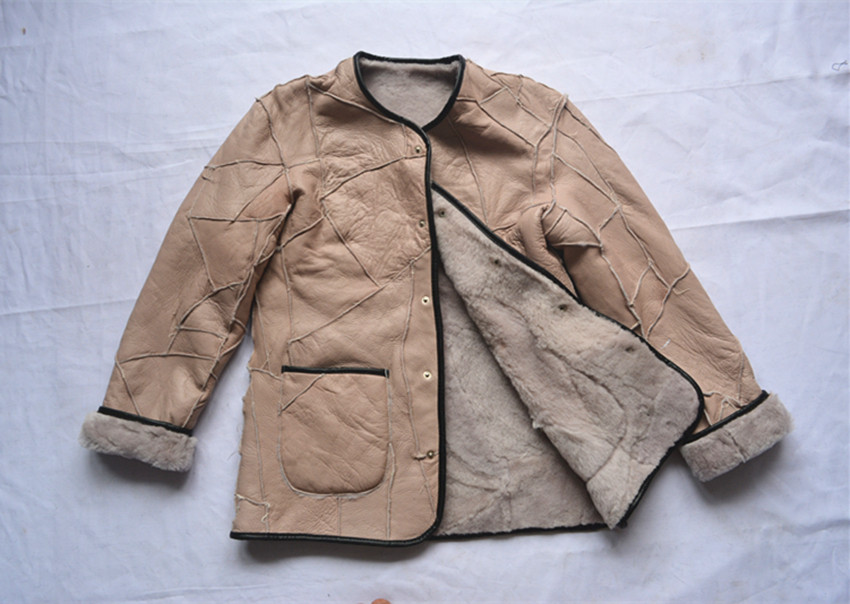 皮毛男女羊剪一体皮衣羊毛内胆衣服包邮羊带袖皮衣