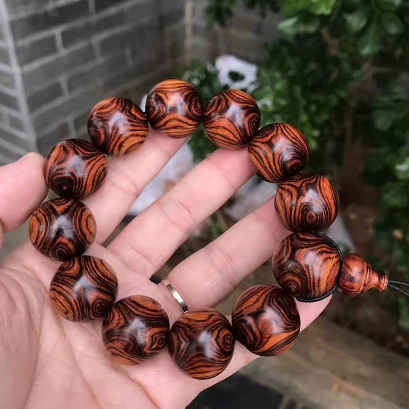 正宗海南黄花梨对眼纹手串降香黄檀保真紫油佛珠佛珠