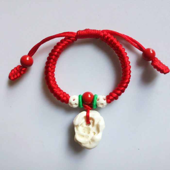 篮手工桃核手串 婴儿宝宝真黑狗牙压邪桃核猪惊骨桃木串儿童平安手链