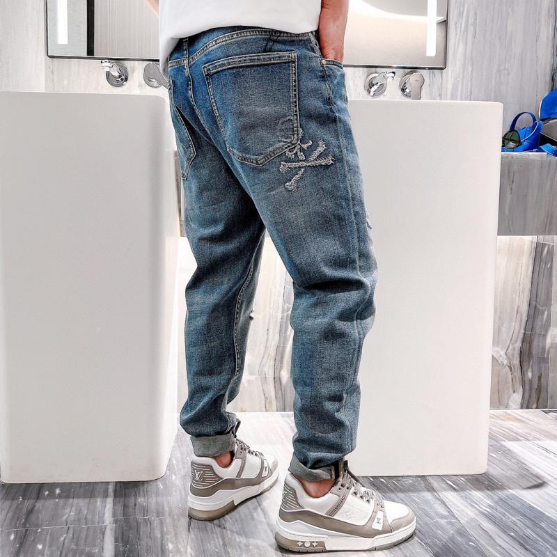 欧美潮牌春夏新款MMJ重工贴布刺绣骷髅头男小脚修身牛仔裤休闲裤