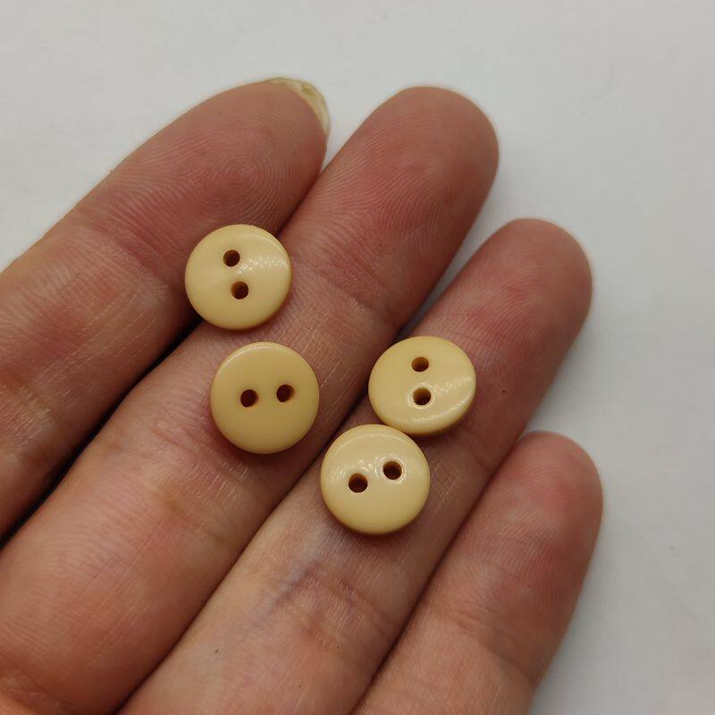 灰色玫红透明藏青大红咖啡色两眼树脂小纽扣子纽扣