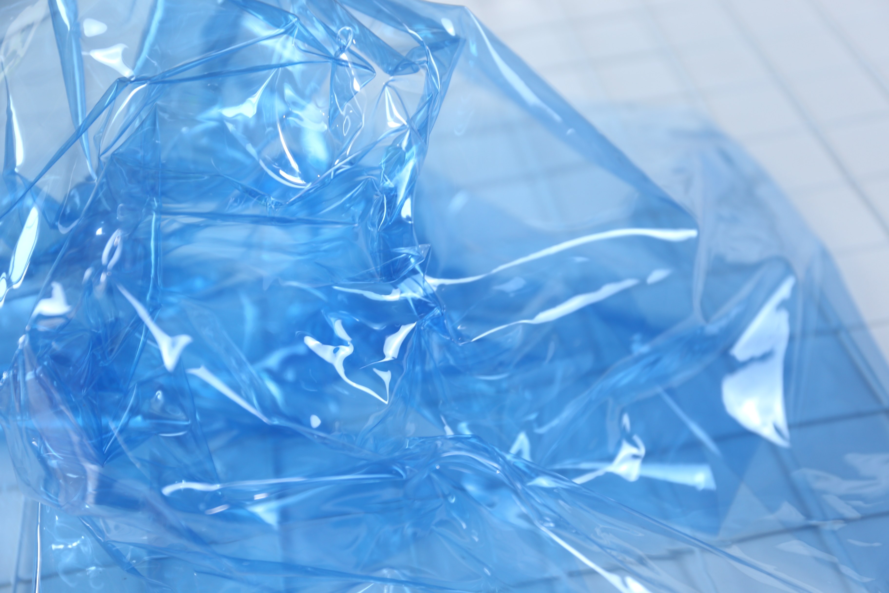 天蓝色tpu防水布防水皮衣塑料薄膜高光透明雨衣海绵垫