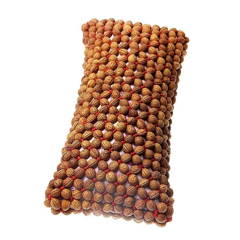 山桃桃核枕头圆形糖果护颈脊椎按摩枕荞麦壳枕头