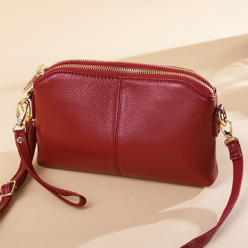 女士手包2022新款时尚真皮手拿包女小包包头手拿包