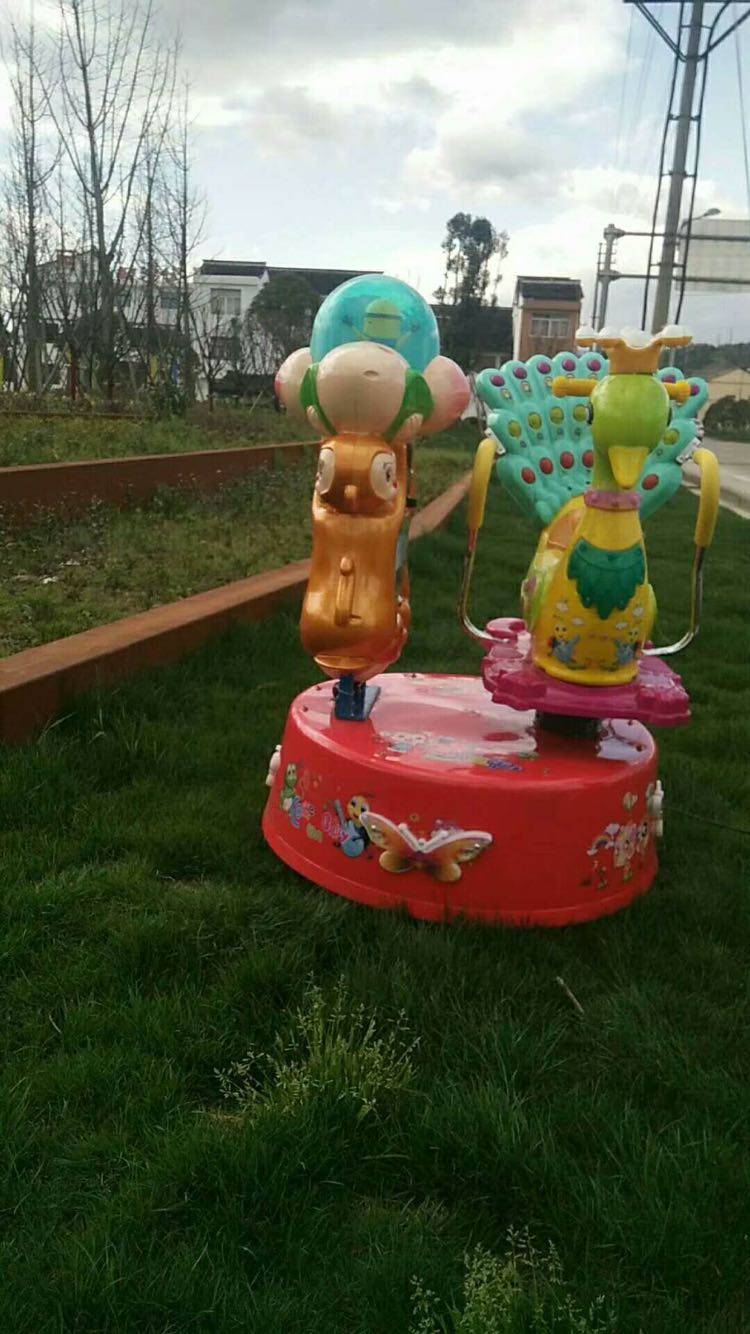 2021新款投币旋转摇摇摇车孔雀摇摆机儿童商用摇摆机