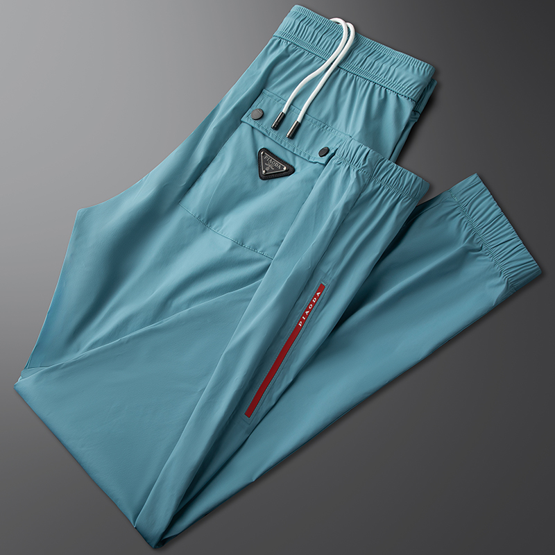 轻奢时尚小标冰丝休闲运动裤男修身小脚裤夏季薄款蓝色束脚裤长裤