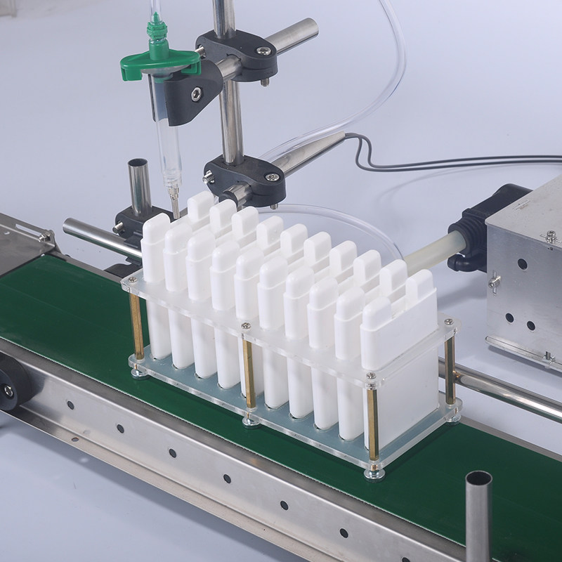 智能全自动传送带单头液体蠕动分装感应灌装机精油灌装机
