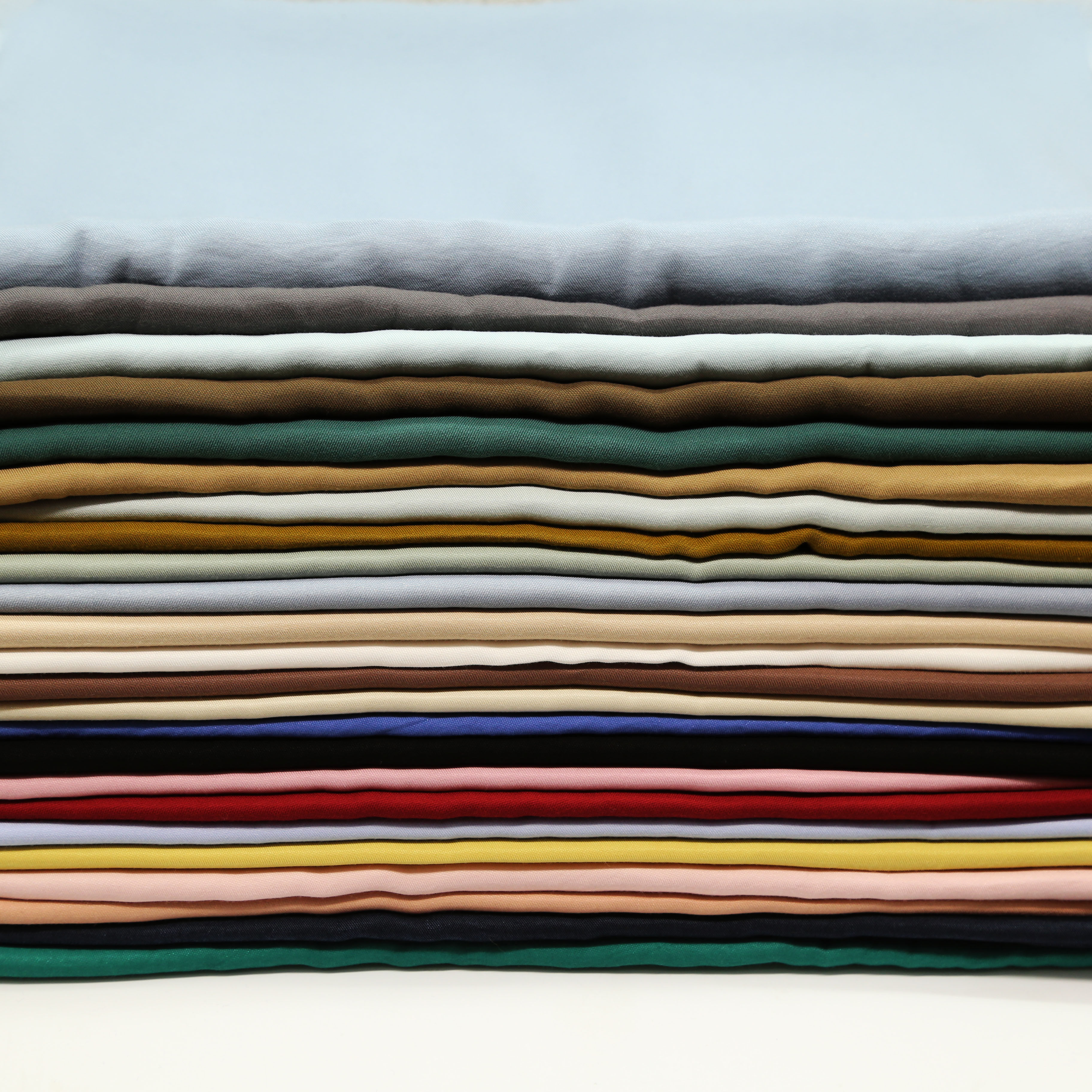 珠光丝缎纯色布料亮光丝滑垂感素色连衣裙面料海绵垫