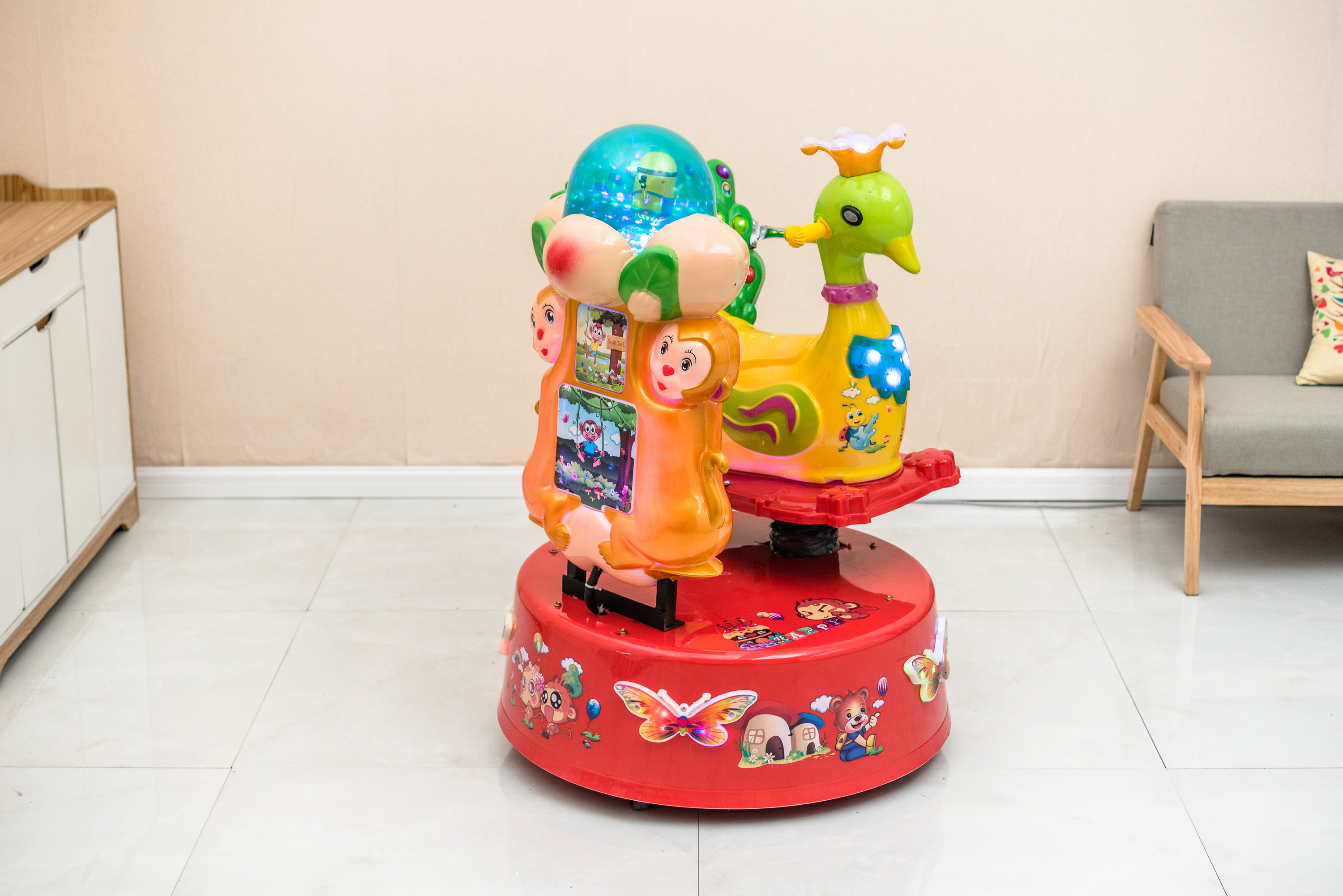 2018新款厂家直销摇摇摇车电动投币旋转孔雀摇摆机