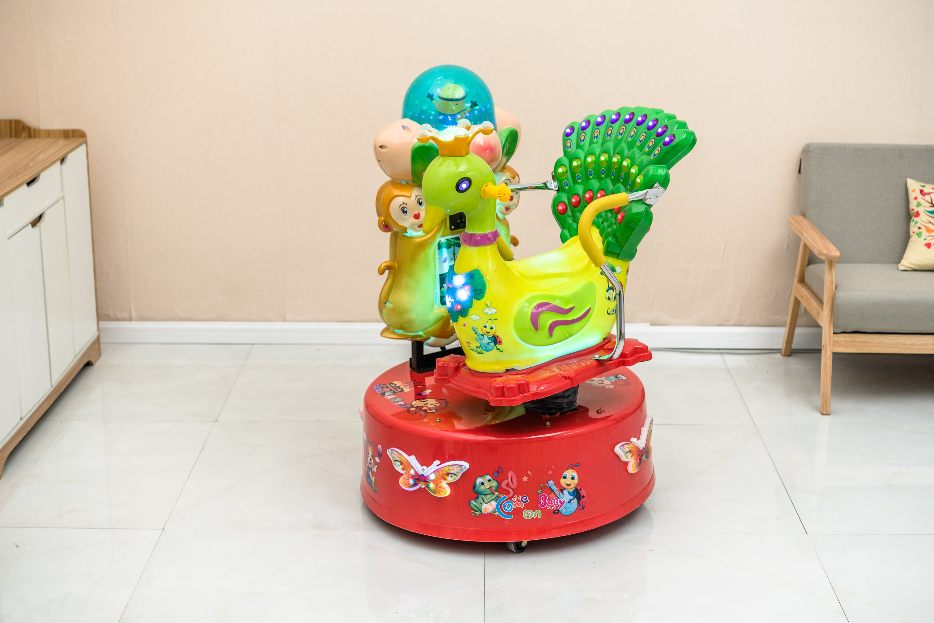 2018新款厂家直销摇摇摇车电动投币旋转孔雀摇摆机