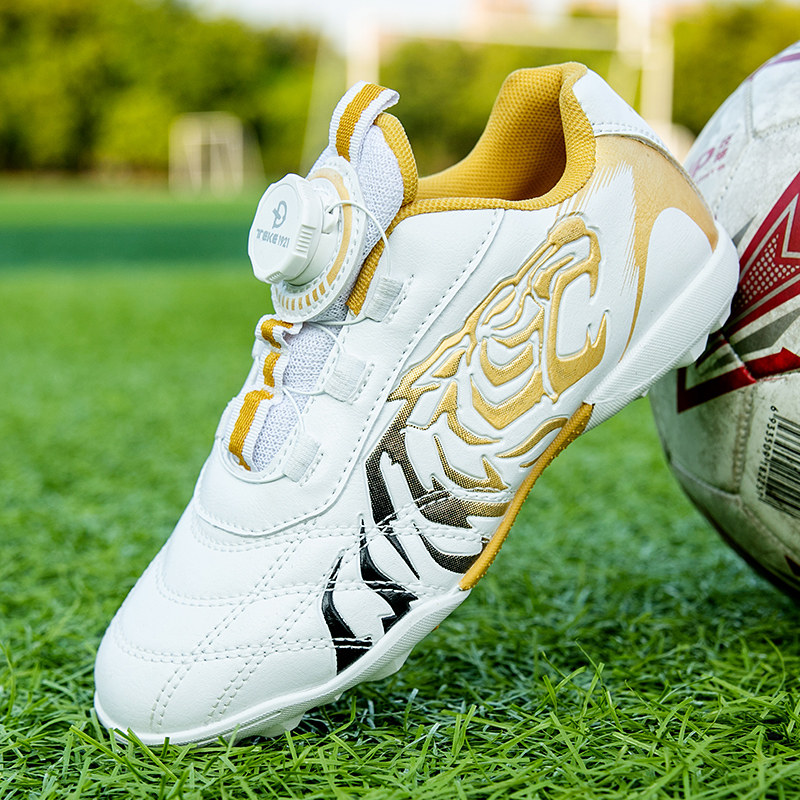 tf女童魔术贴防滑 华强回力旋转钮扣儿童足球鞋 男童小学生碎钉球鞋