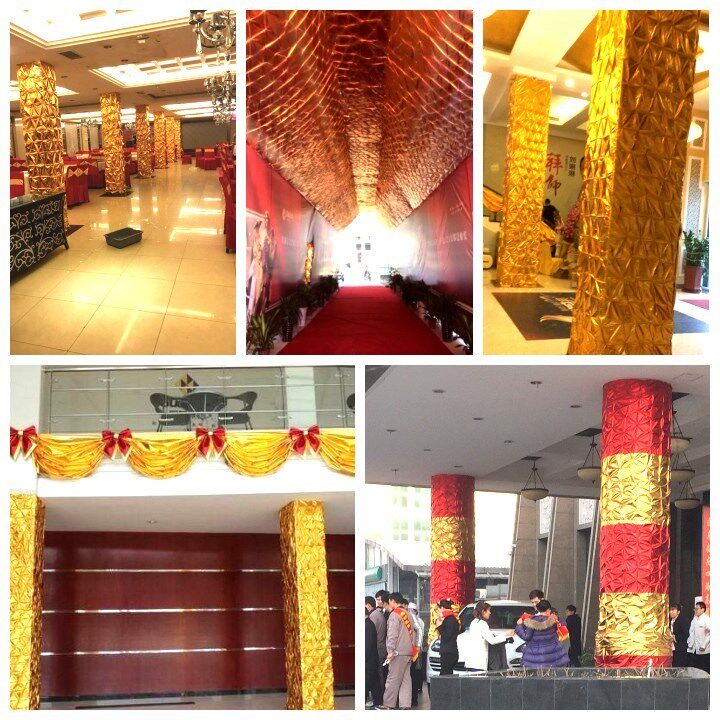 旅游景点裹包树金色装饰布料过年酒店里包墙包装柱子黄金纸塑料膜