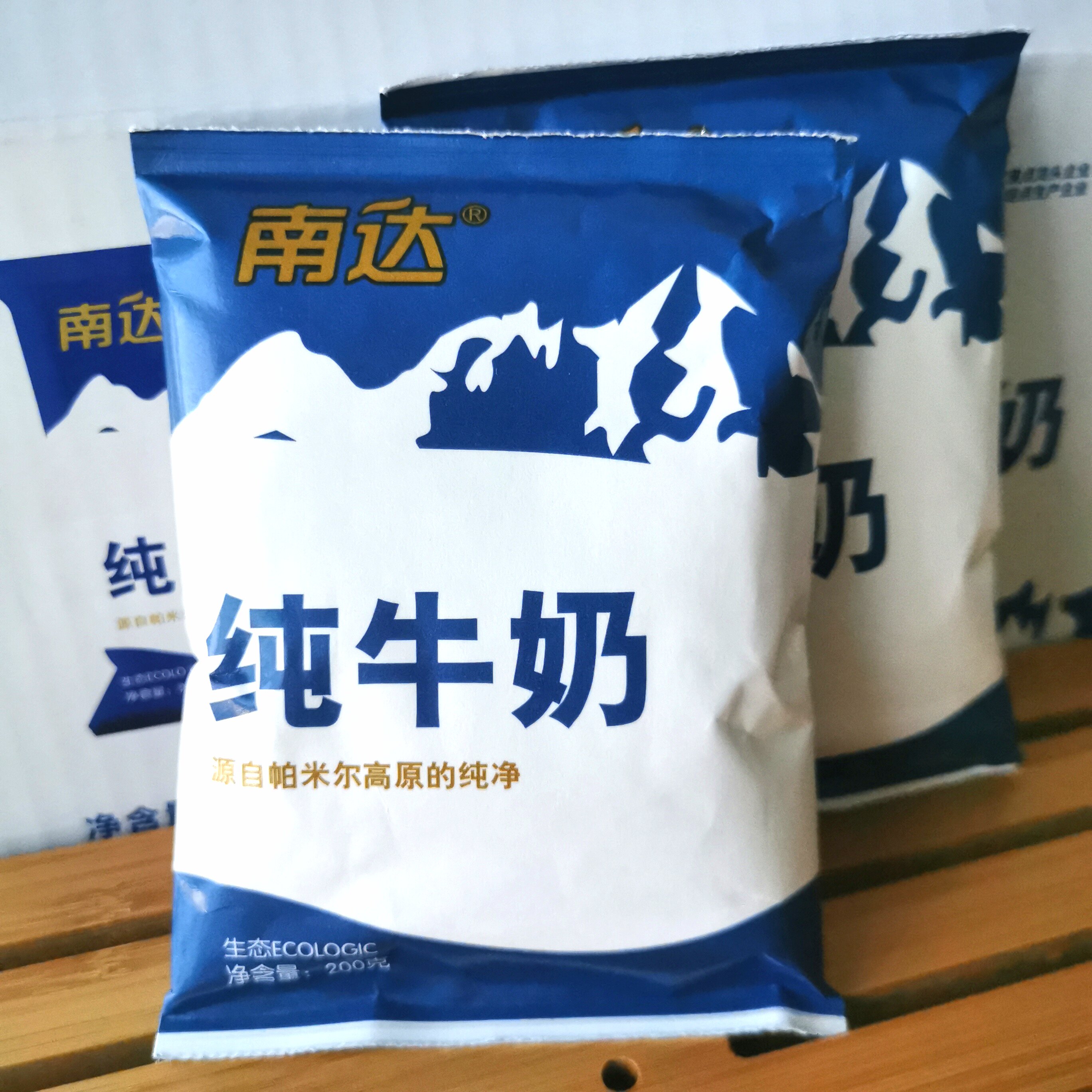 新疆南达纯牛奶200g袋装整箱成人青少年学生儿童纯牛奶