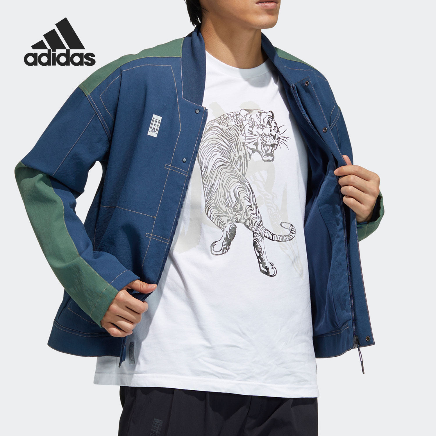 adidas阿迪达斯正品2022新款男子武极运动服蓝绿拼接运动茄克