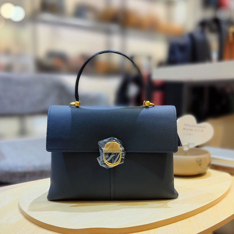 欧米omi包包女万达专柜同款真牛牛皮女士大容量通用款女包