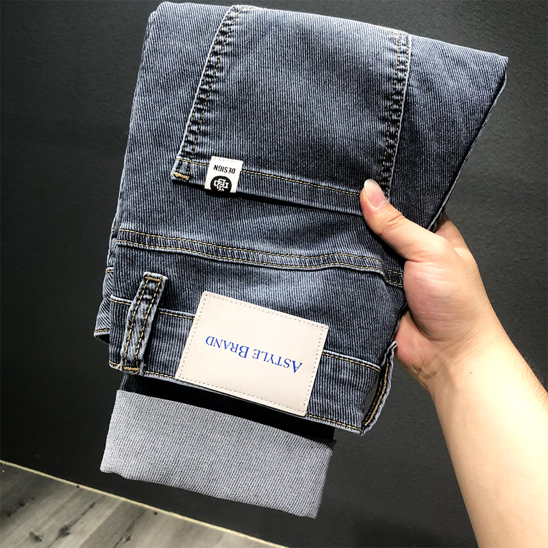 蓝色牛仔裤男潮牌2022春季新款潮流青年修身小脚韩版休闲裤长裤子