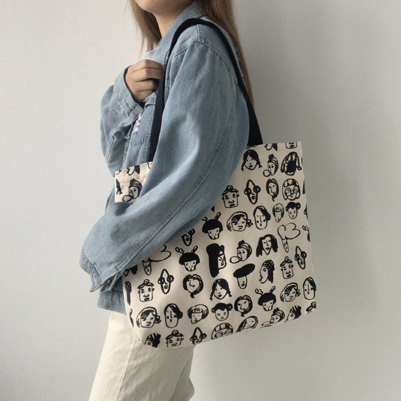 无别秋冬新款大容量女士帆布帆布包包袋印花人头女士包袋