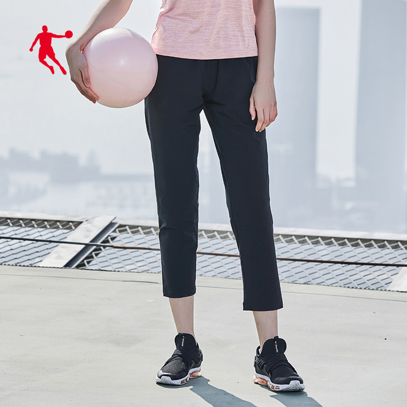 乔丹运动裤女2020春季新款梭织裤运动长裤女休闲卫裤收口九分裤子