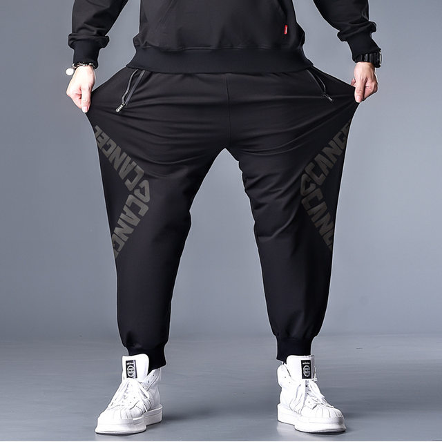 Add fat to increase sports pants men's large size fat fat people loose trendy foot trousers fat spring and autumn casual pants Add fat to increase sports pants men's large size fat fat people loose trendy foot trousers fat spring and autumn casual pants