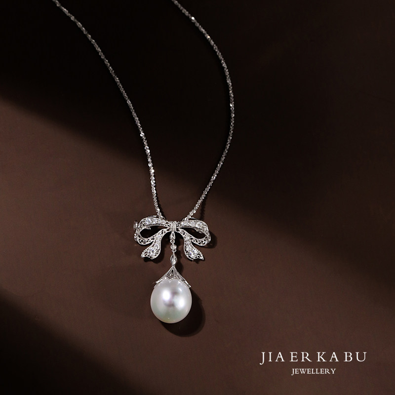 在佳古董珠宝蕾丝蝴蝶结设计椭圆大白白珍珠吊坠颈饰
