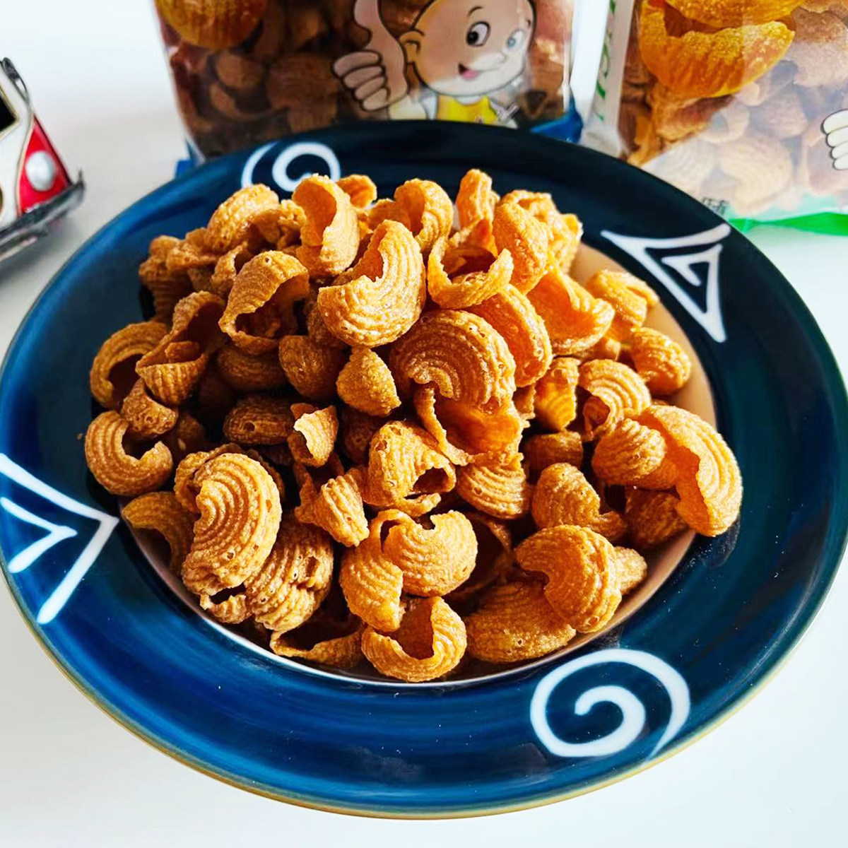 蜗牛潘氏兄弟118g怀旧零食袋装牛派贝壳海螺膨化食品