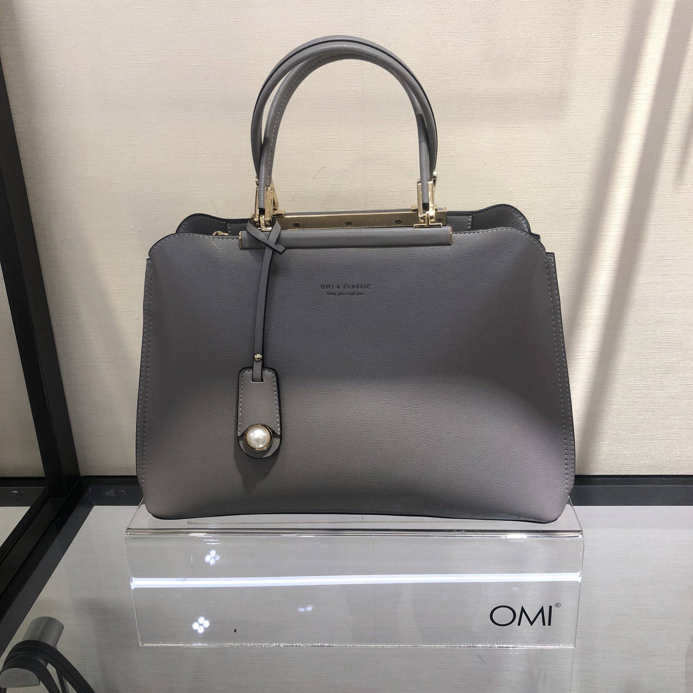 欧米omi女包omi包包实拍珍珠挂件牛皮皮包通用款女包