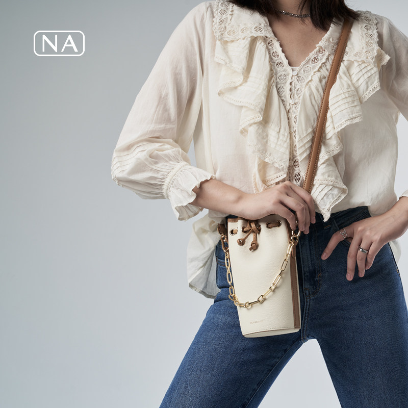 noiratelier新品独立设计抽绳束口酒桶斜挎包进口通用款女包