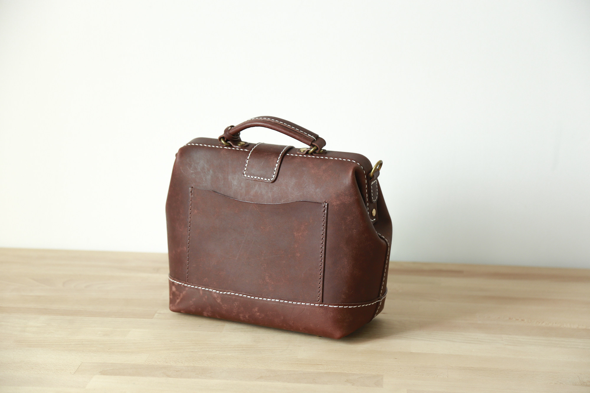 包纯真皮口金包手提复古牛皮手工医生切线派英伦女士包袋