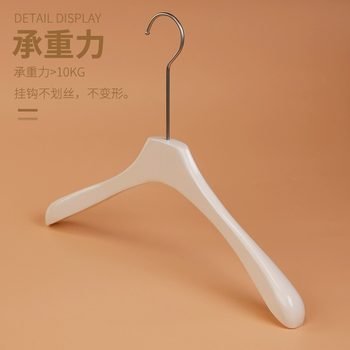 ຮ້ານຂາຍເສື້ອຜ້າ hanger ນົມພິເສດສີຂາວໄມ້ແຂງ hanger ເຄື່ອງນຸ່ງຫົ່ມຂອງແມ່ຍິງອິນເຕີເນັດສະເຫຼີມສະຫຼອງເຄື່ອງນຸ່ງຫົ່ມສະຫນັບສະຫນູນ high-end non-slip trouser rack custom logo