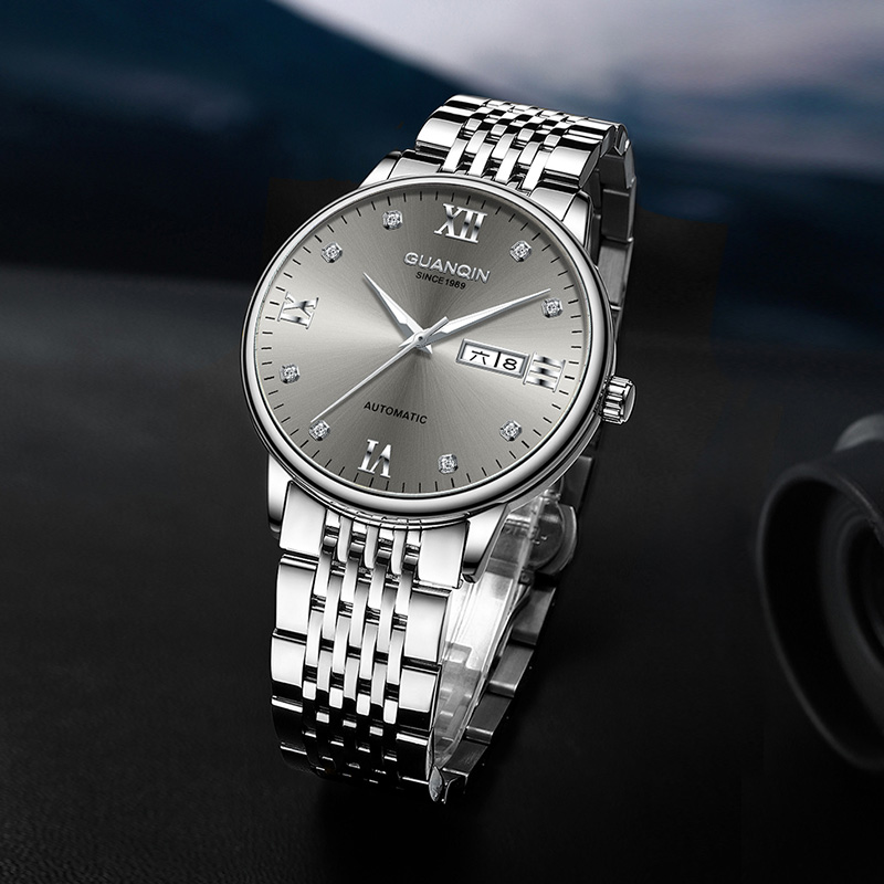 冠琴新款手表男镂空机械表全自动时尚商务精钢带防水夜光男士腕表