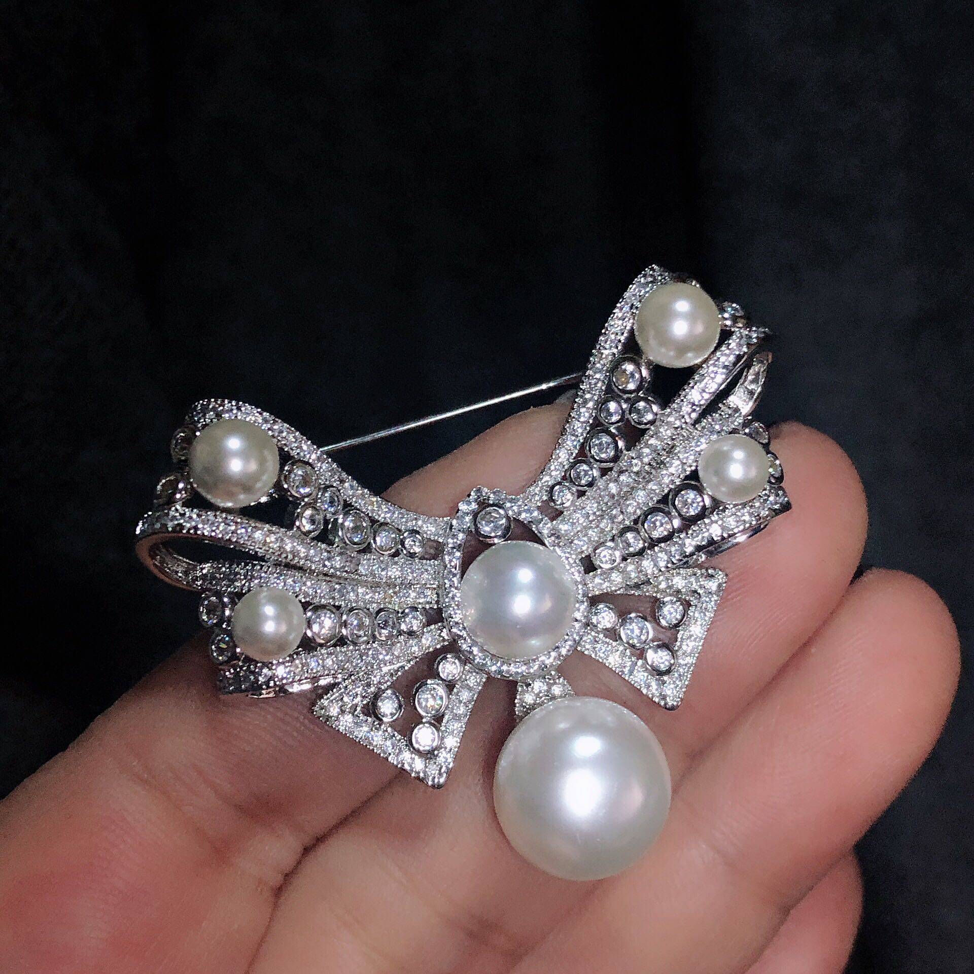 蝴蝶结胸针高档镶嵌珍珠奢华大气镀金唯美美女胸针