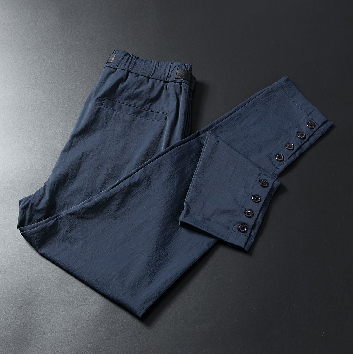 春夏新款时尚男裤 裤脚纽扣透气弹力面料男士薄款修身小脚休闲裤