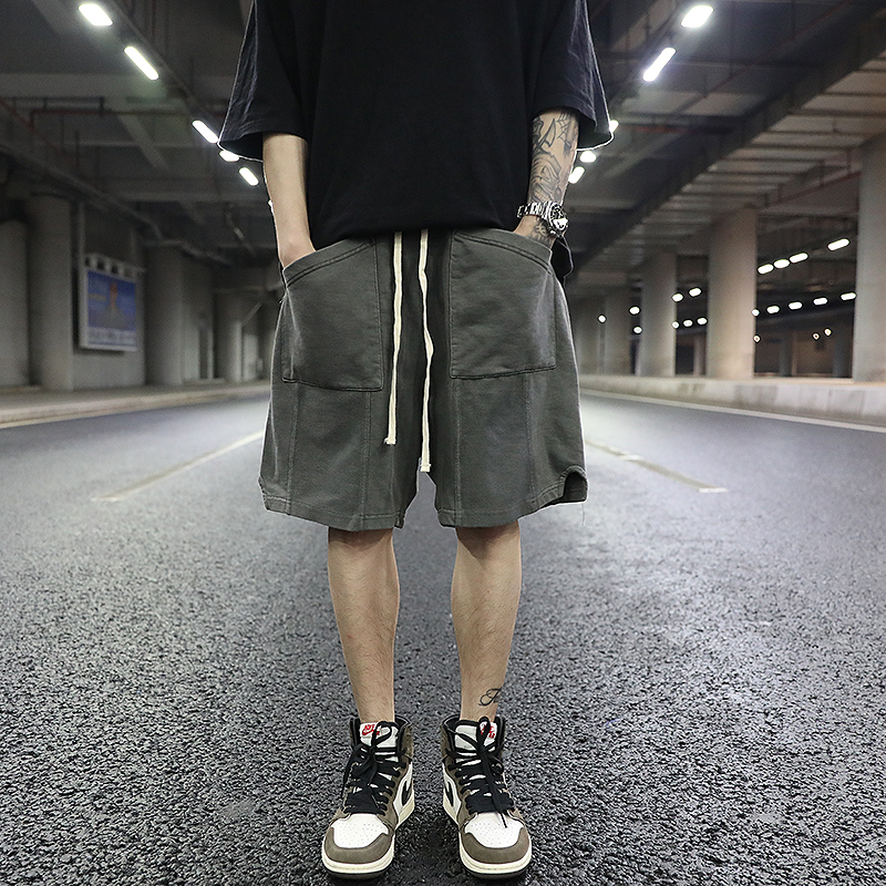 KANYE欧美高街风复古洗水做旧不规则口袋开叉短裤 潮牌滑板五分裤