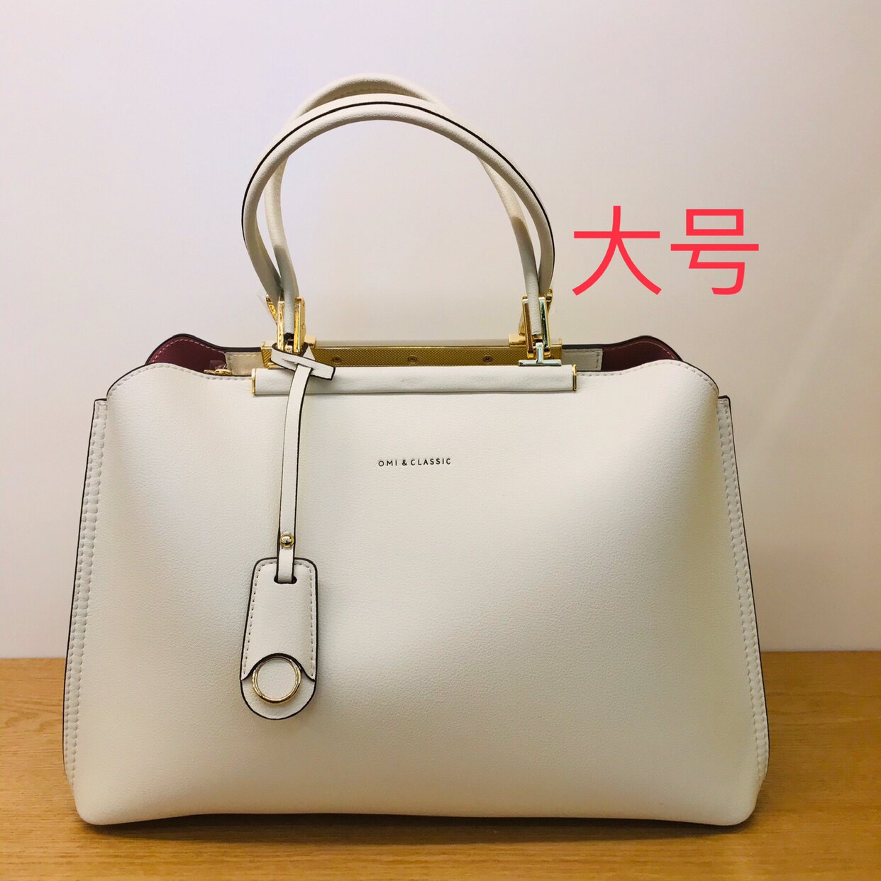 手提包欧米手提包包omi新款牛皮女包托特omi通用款女包