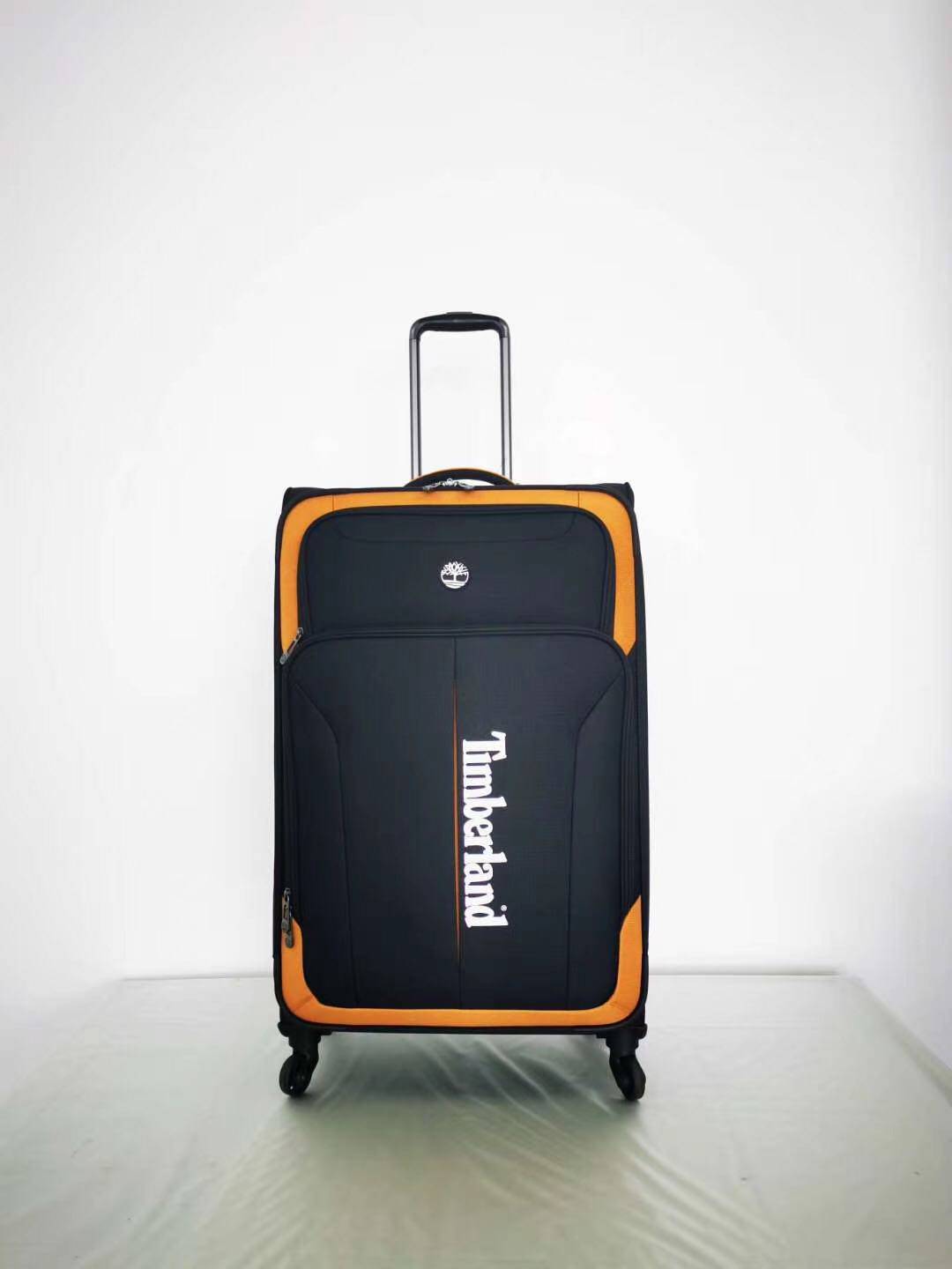 美国timberland牛津布登机箱万向轮超轻布箱密码箱防水28寸拉杆箱