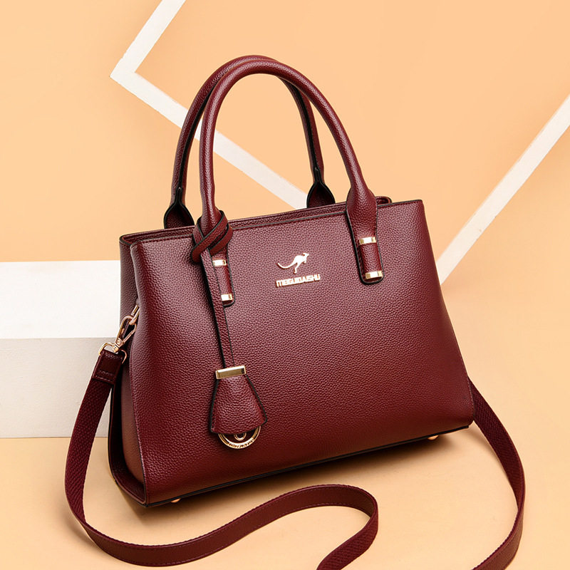 袋鼠皮包结婚妈妈手提包女士中年真皮包包百搭通用款女包