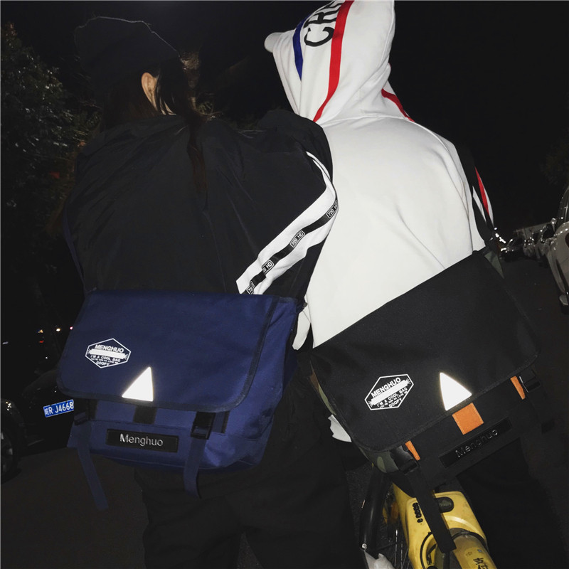 潮牌帆布单肩包男反光死飞包邮差包港风挎包机车骑行包斜跨包书包