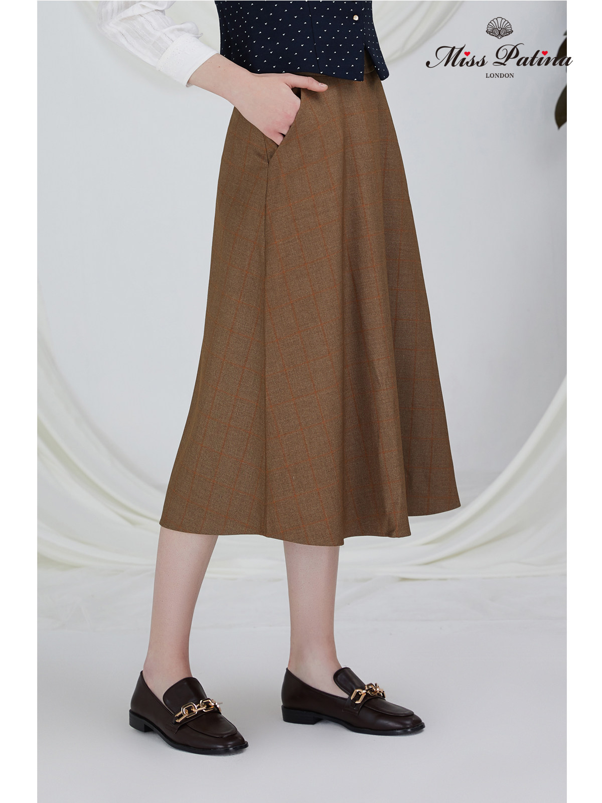 爱德华情书高端西服面料英伦棕色格子字型显瘦半身裙