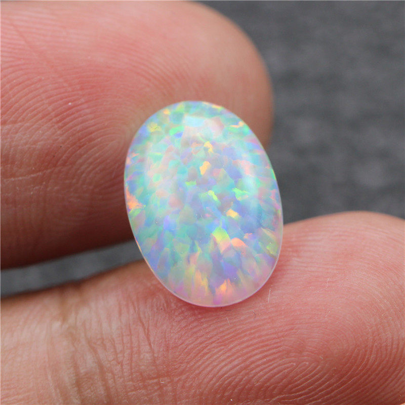 斑彩欧泊椭圆形平底光面合成澳宝裸石彩宝镶嵌其它首饰