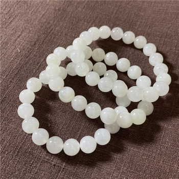 ທໍາມະຊາດ Hotan Jade Mutton Fat White Jade Ball Bracelet Qinghai ວັດສະດຸ Hotan Jade ເຄື່ອງປະດັບສໍາລັບແມ່ຍິງທີ່ມີຜິວຫນັງທີ່ມີຄວາມຊຸ່ມຊື່ນແລະຮອຍດ່າງເລັກນ້ອຍ