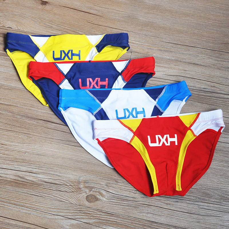 男士低腰三角泳裤比基尼沙滩游泳时尚拼接性感男士泳衣
