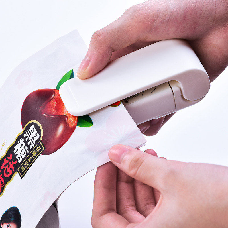 日本迷你手压式封口机小型家用塑料袋封口器食品封口夹电热密封机