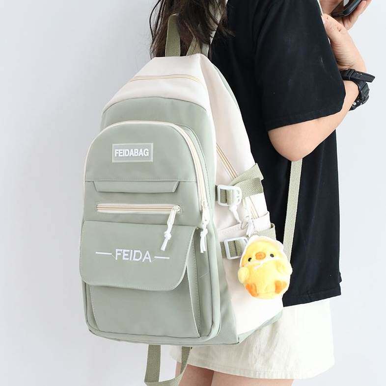 女孩书包四五六年级用男初中生韩版小清新大容量帆布校园双肩背包