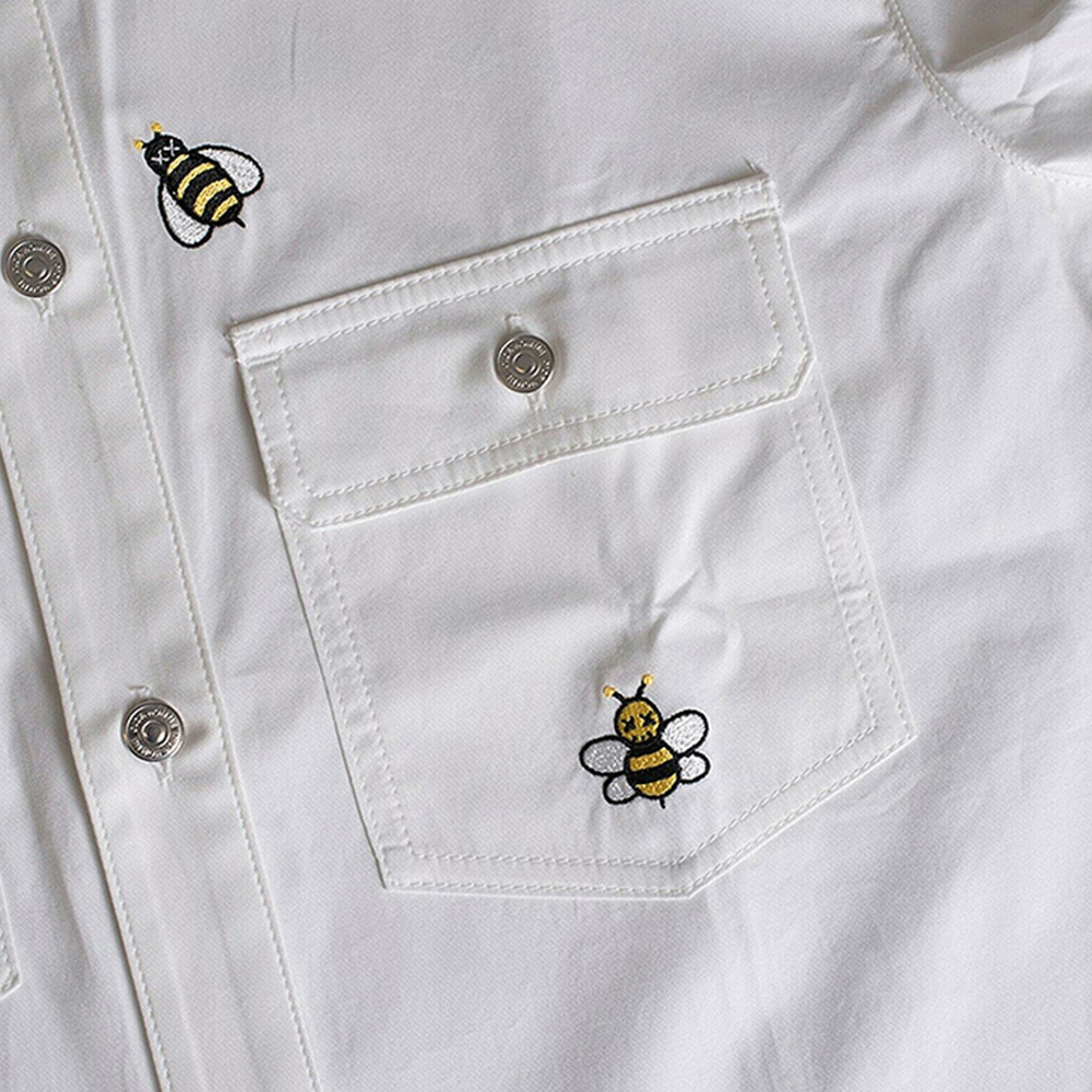 蜜蜂标志的衬衣图片