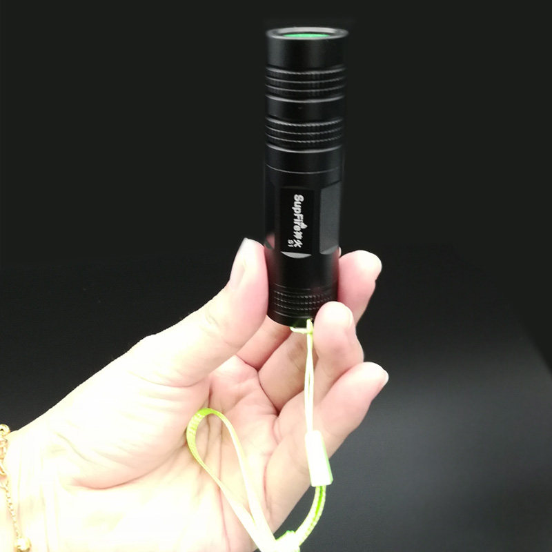 神火超亮外手户外防水袖珍便携家用小型强光手电筒