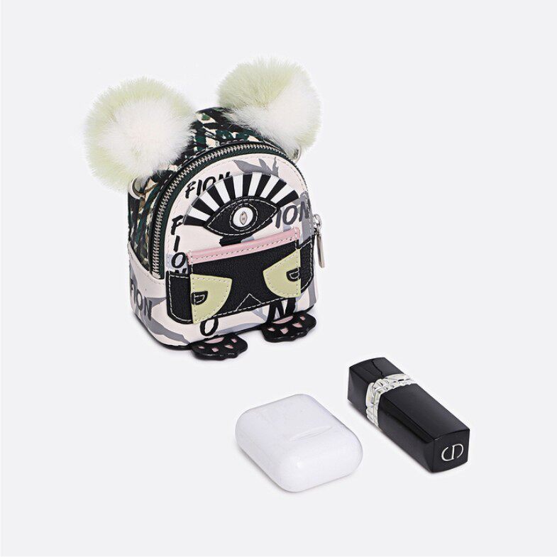 fion菲安妮小怪兽耳机2022新款萌趣质感时尚链条通用款女包