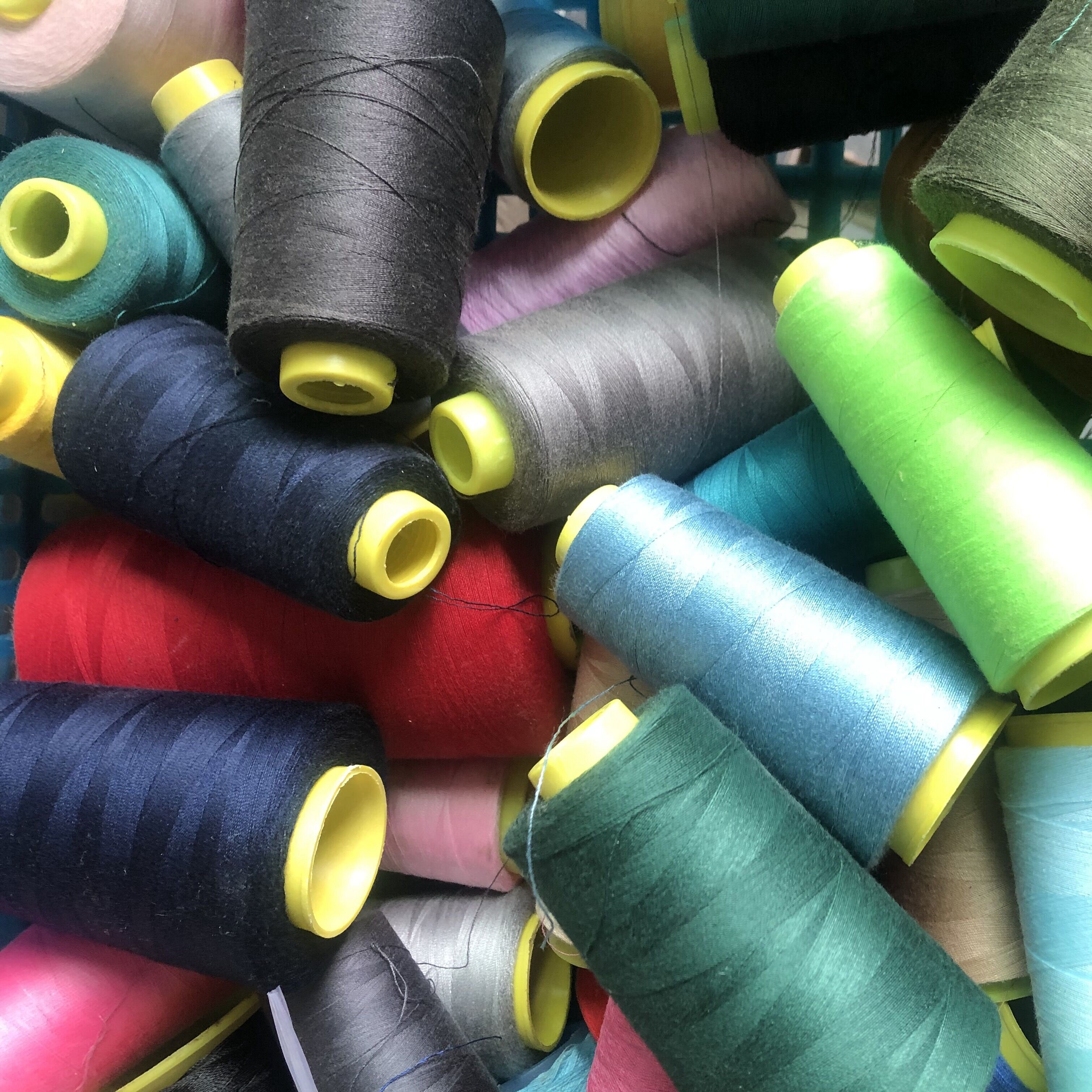 厂家包邮】高速拷边线/称斤颜色随机/底线/纺织边线机头线/缝纫线