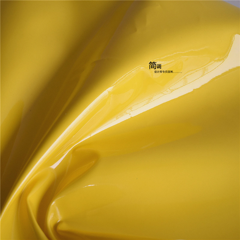 原创黄色无弹硬挺亮光镜面pu皮革面料箱包造型设计师服装tpu布料